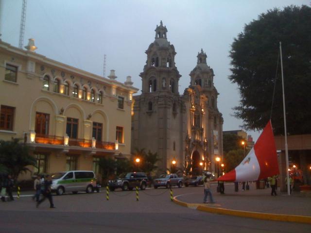 Flag down at sunset back in Lima