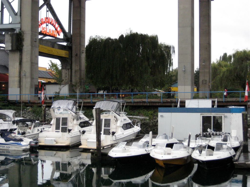 Heron on right-most boat